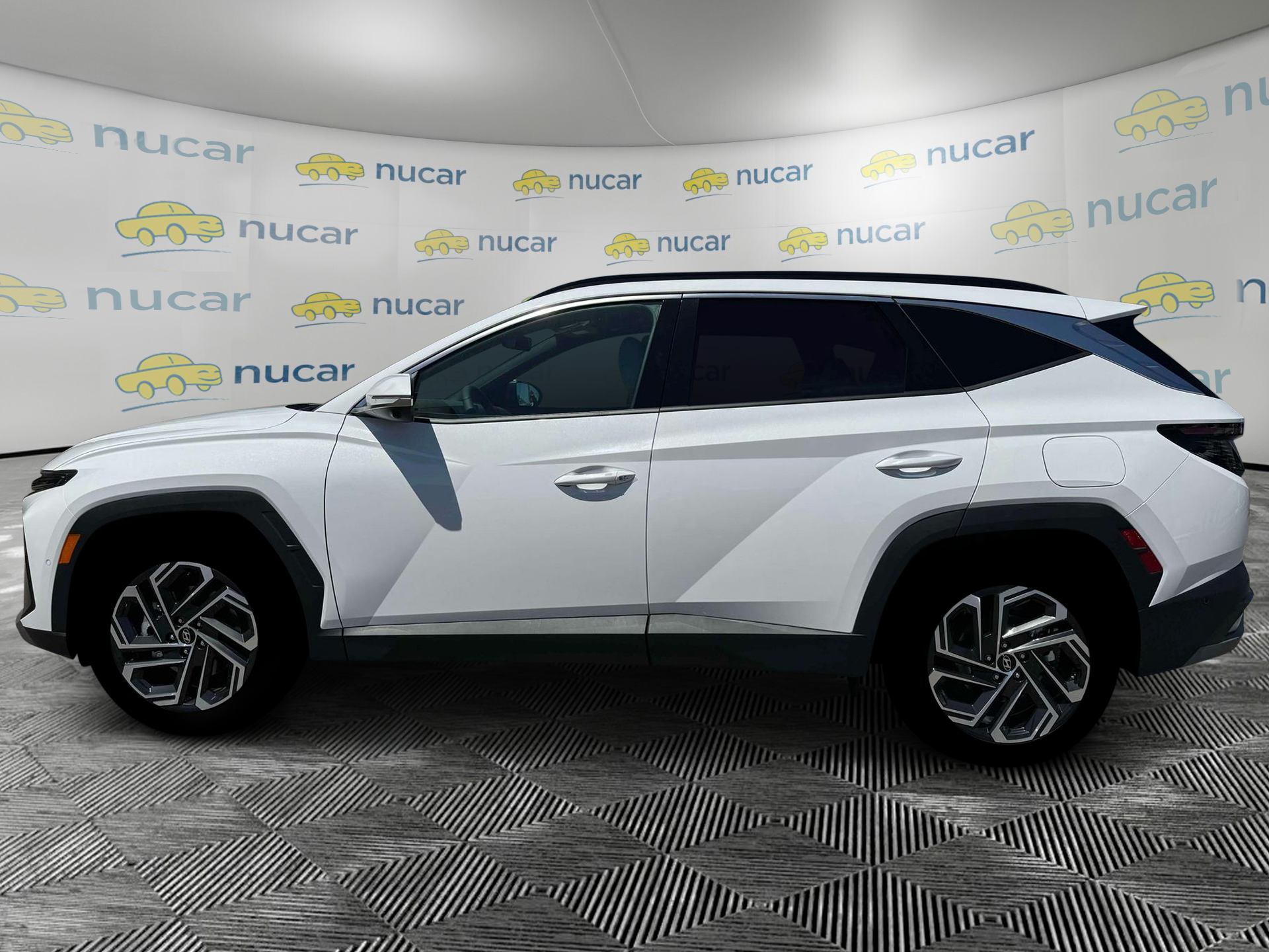 2026 Hyundai Tucson Limited in White at Nucar — photo 3