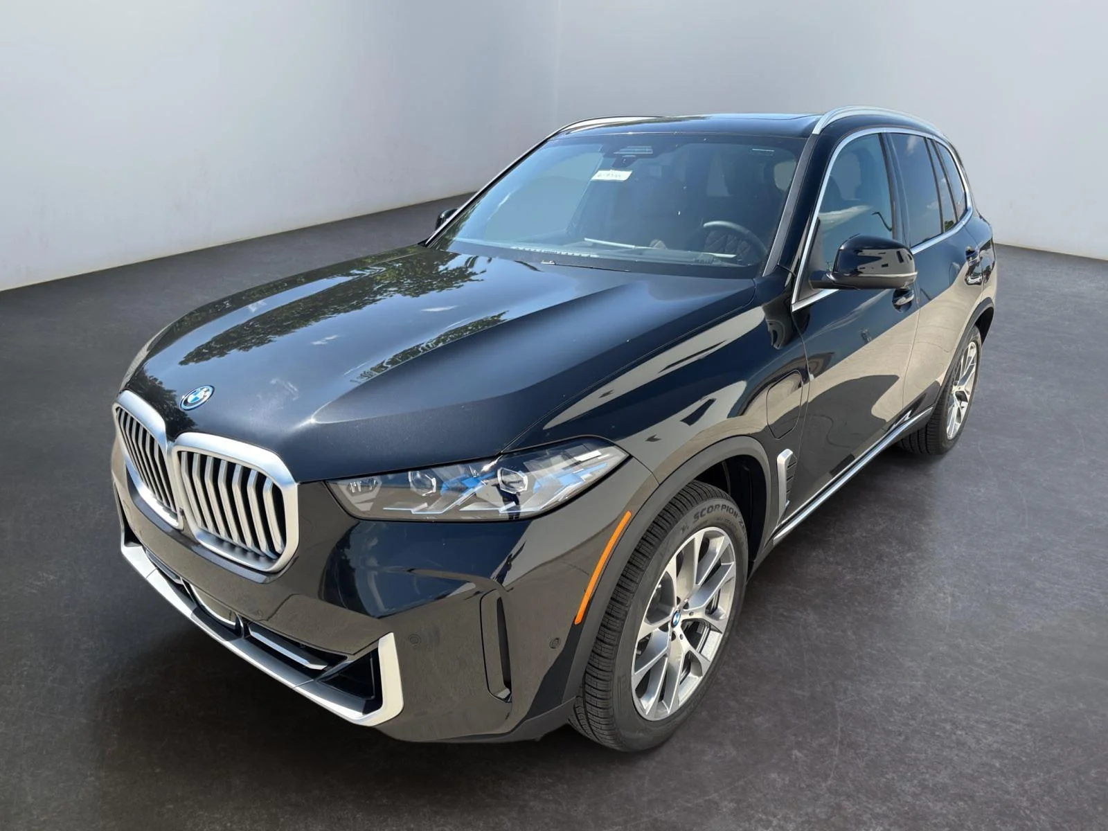 New 2026 Black Sapphire Metallic BMW xDrive50e image 9