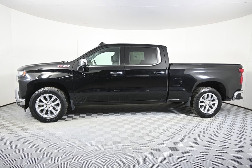 Used 2021 Chevrolet Silverado 1500 LTZ with VIN 3GCUYGEDXMG388824 for sale in Forest Lake, Minnesota