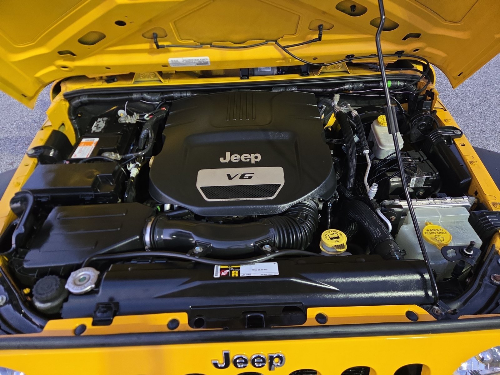Used 2015 Baja Yellow Clearcoat Jeep Sport image 18