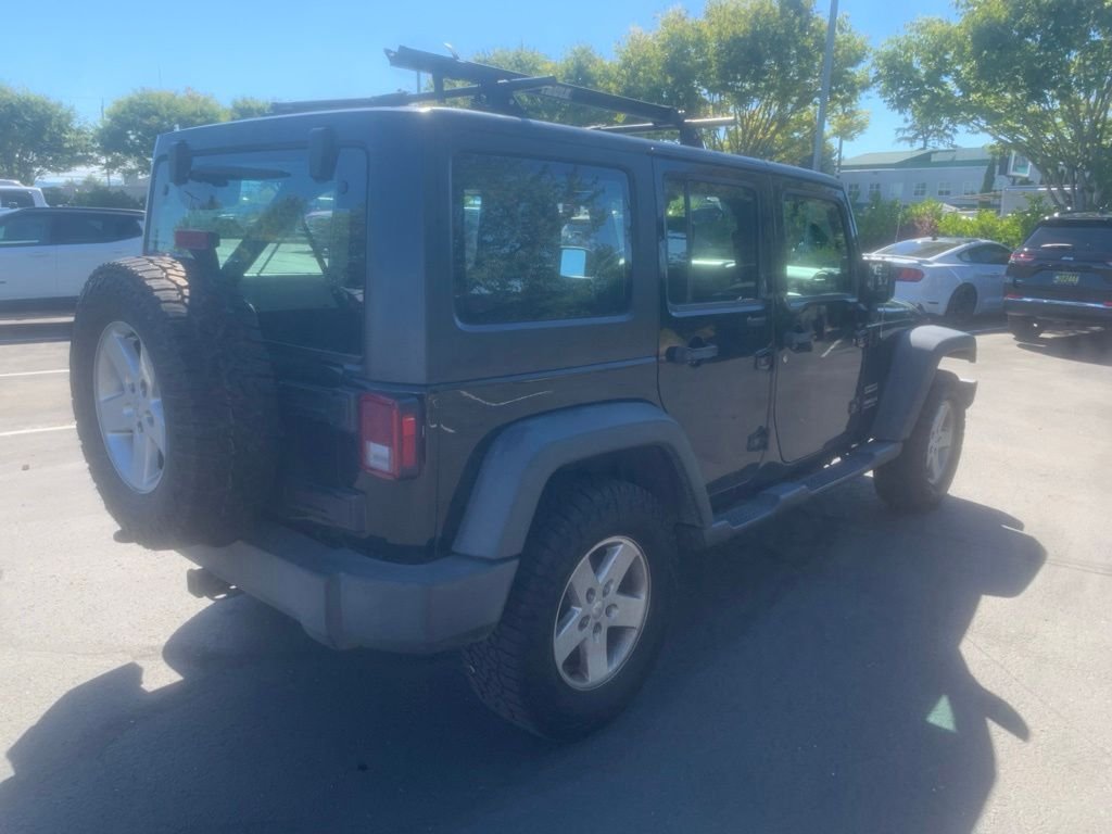 Used 2016 Black Clearcoat Jeep Unlimited Sport image 4