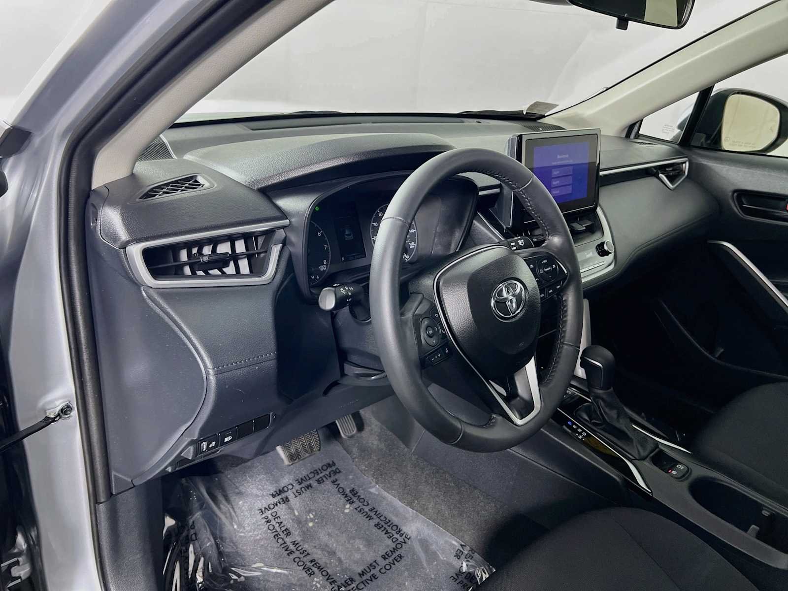 Used 2024 Sonic Silver Toyota LE image 9