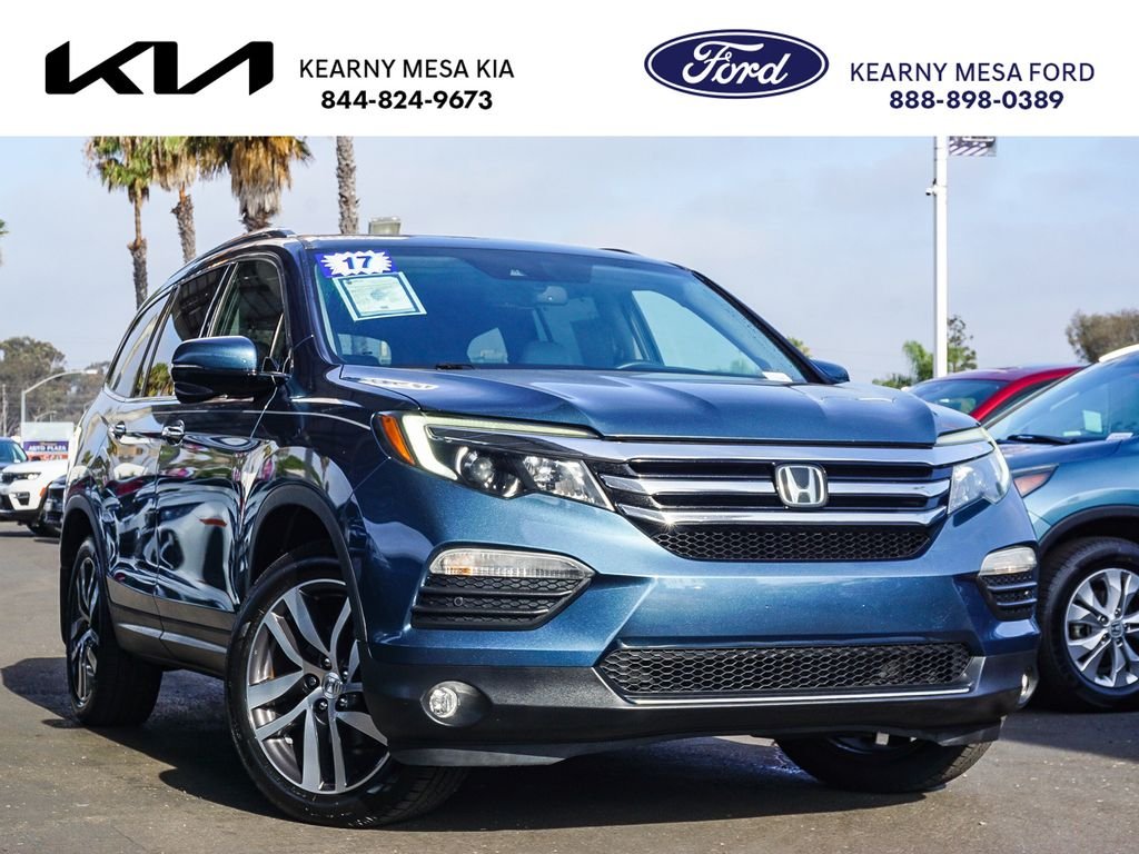 Used 2017 Blue Honda Touring image 1