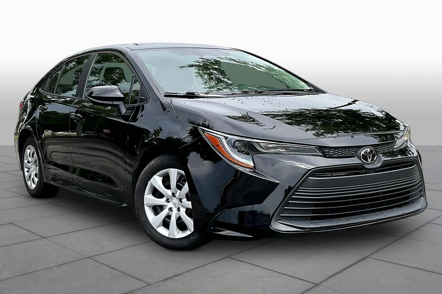 Used 2024 Midnight Black Metallic Toyota LE image 3