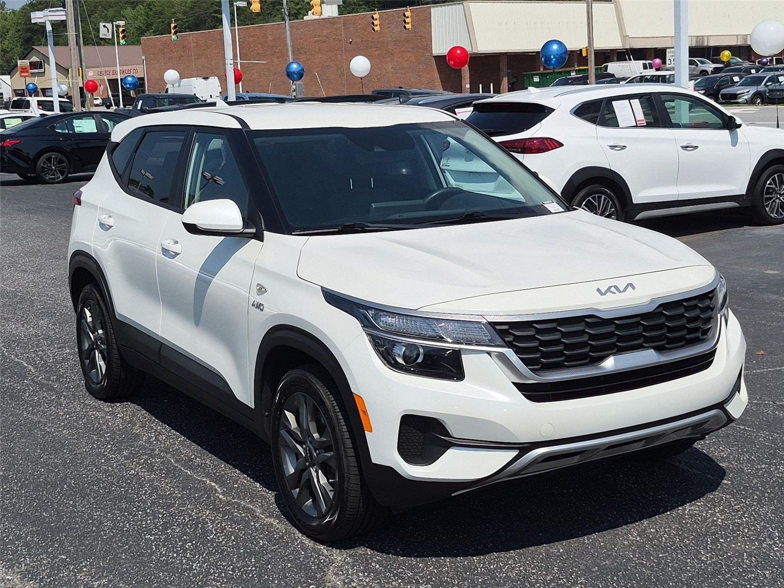 Used 2023 Snow White Pearl Kia LX image 7