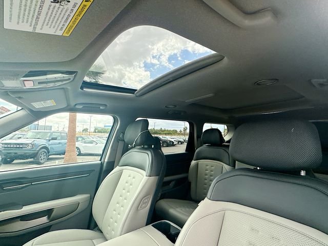New 2026 Ivory Silver Kia Wind AWD image 23