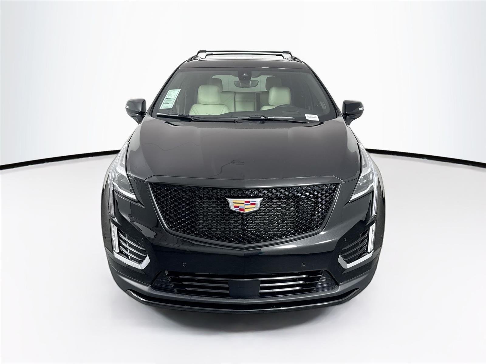 Used 2024 Stellar Black Metallic Cadillac AWD Sport image 9