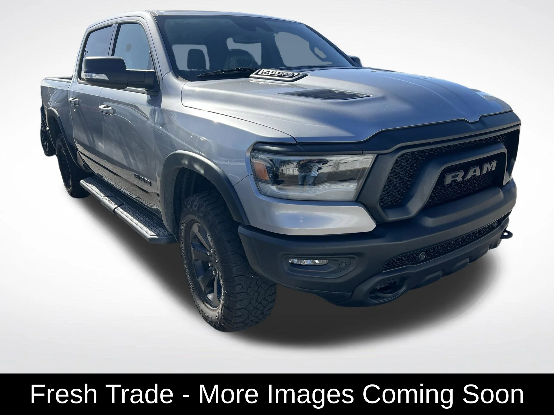 Used 2022 Silver Ram Rebel image 1