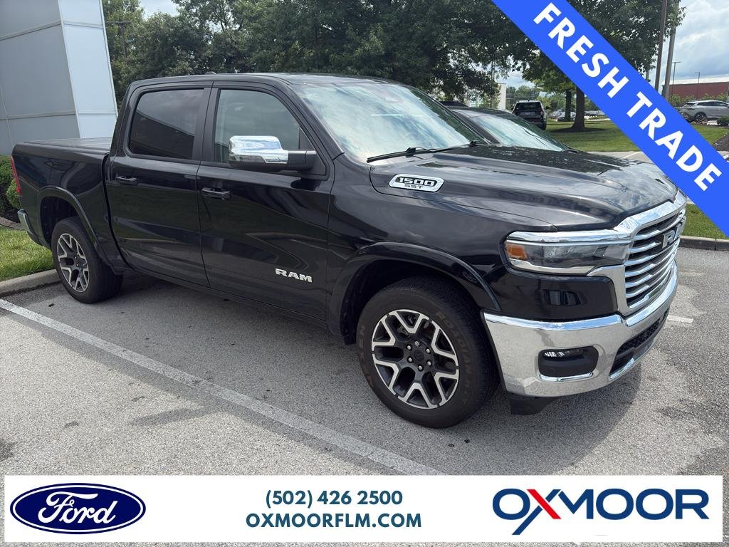 Used 2025 Diamond Black Crystal Pearlcoat Ram Laramie image 1