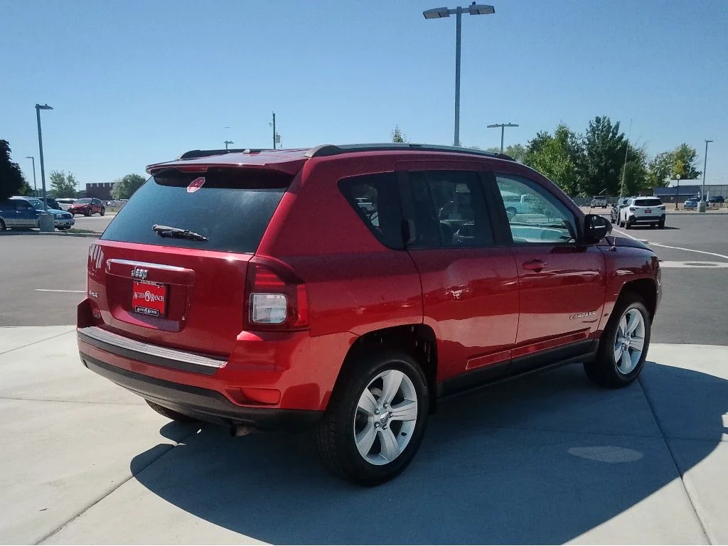 Used 2016 Deep Cherry Red Crystal Pearlcoat Jeep Sport image 3