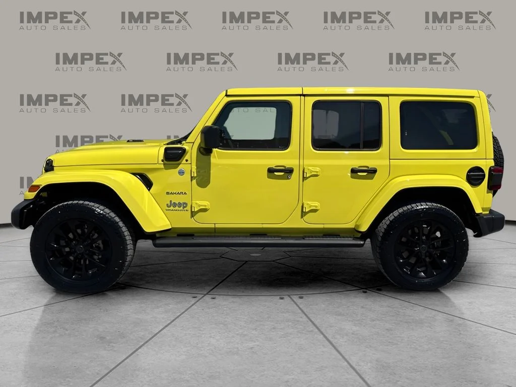 Used 2024 Yellow Jeep Sahara 4xe image 2