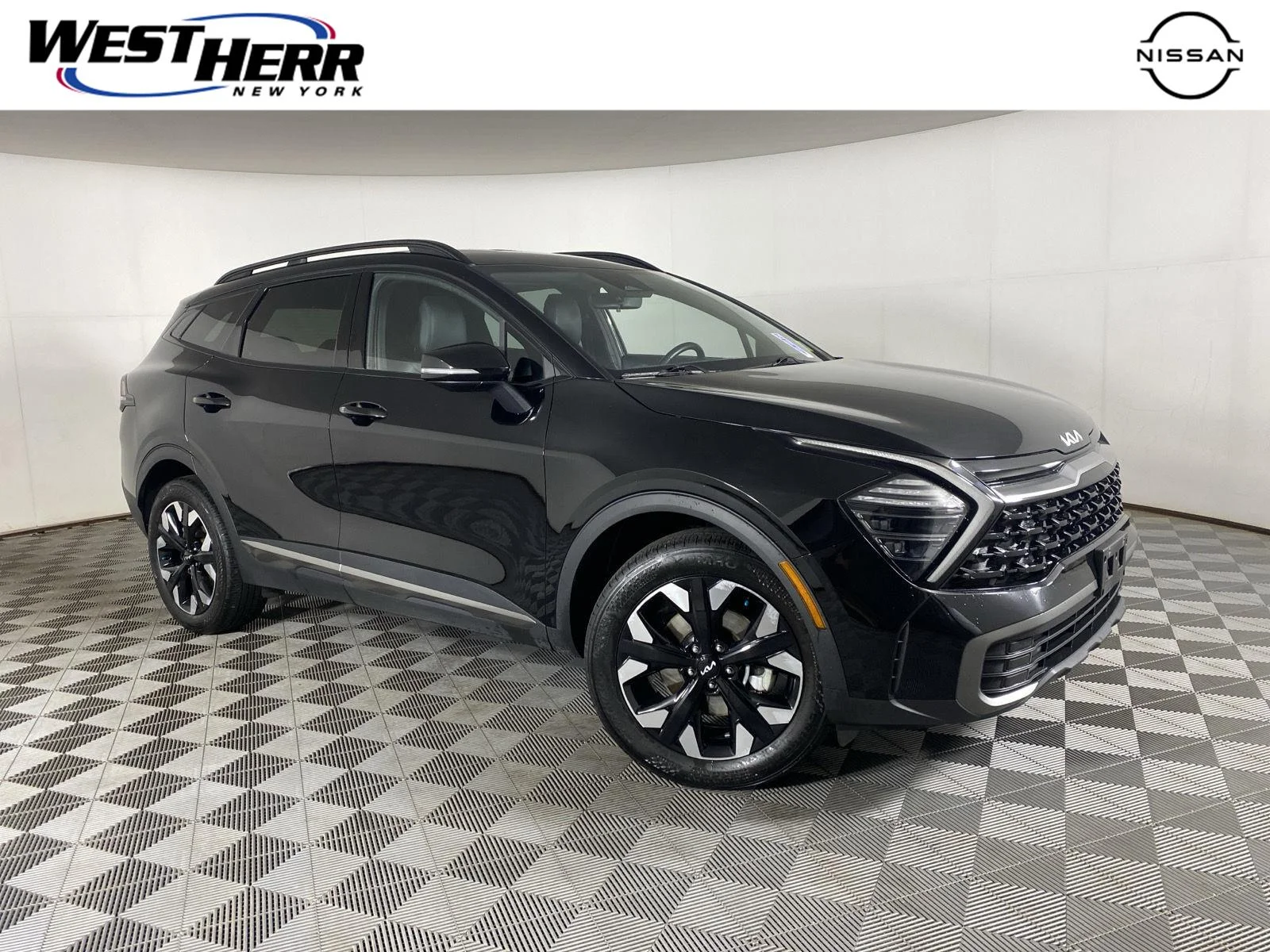 Used 2024 Ebony Black Kia X-Line image 1