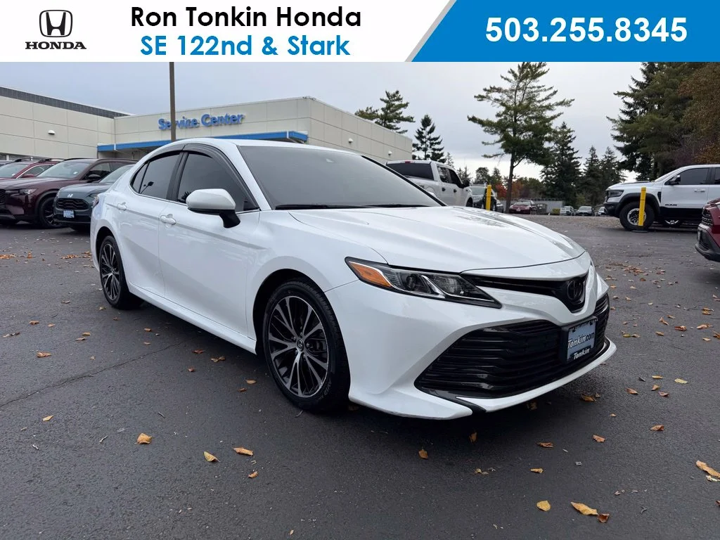 Used 2019 Super White Toyota LE image 1