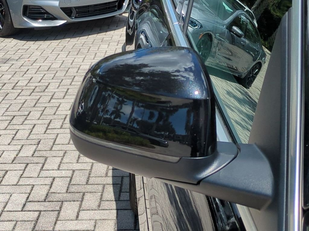 New 2026 Black Sapphire Metallic BMW xDrive50e image 12