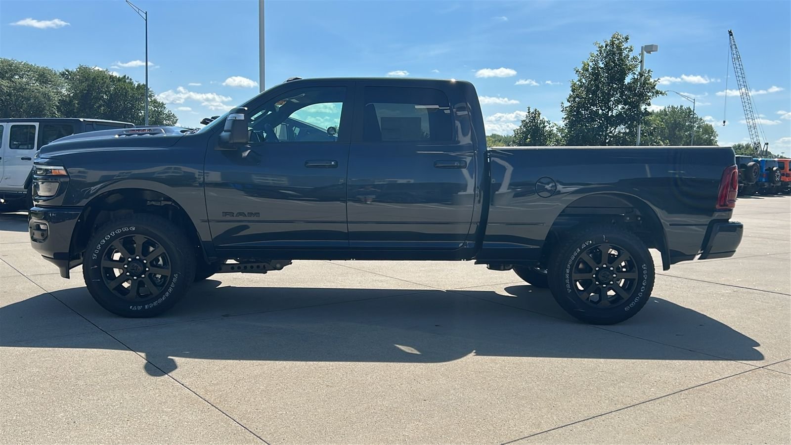 New 2026 Forged Blue Metallic Exterior Paint RAM Laramie image 7