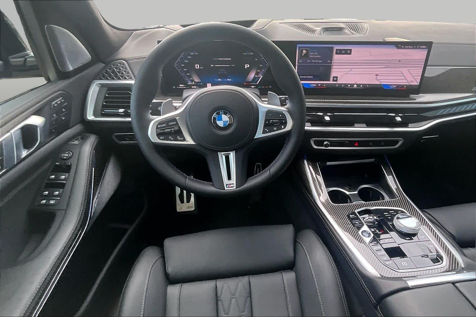 Used 2026 Black Sapphire Metallic BMW M60i image 5