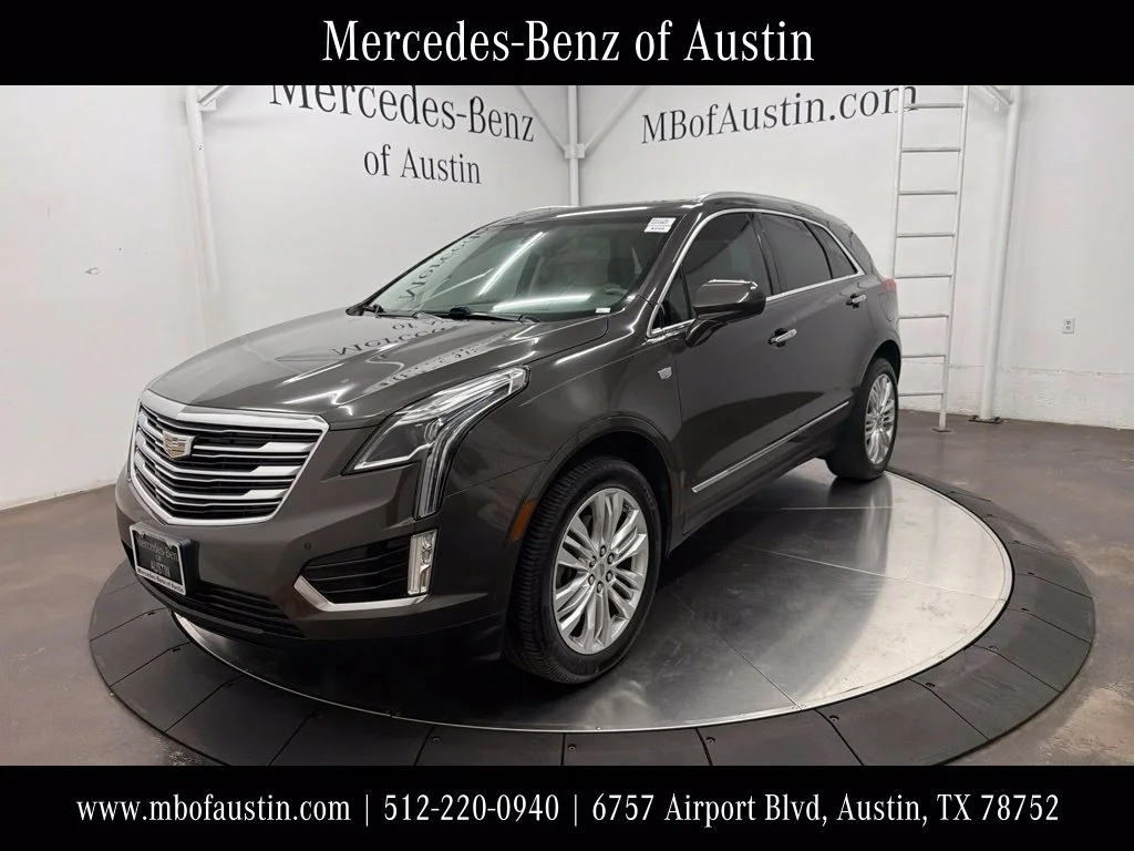 Used 2019 Brown Cadillac Premium Luxury image 1
