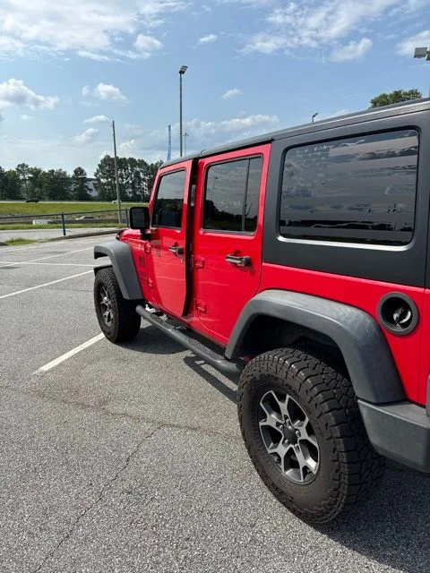 Used 2016 Firecracker Red Clearcoat Jeep Unlimited Sport image 4