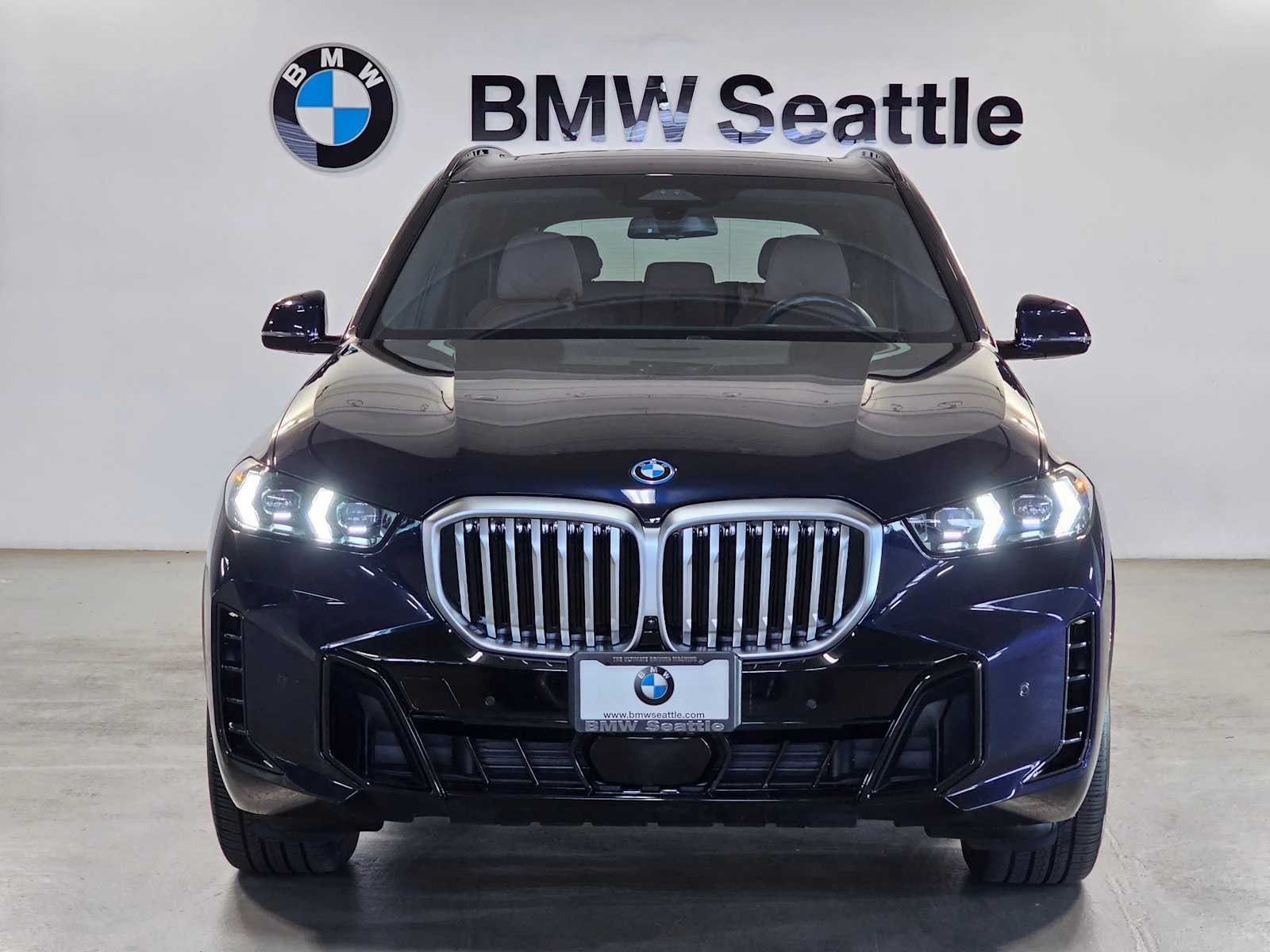Used 2024 Carbon Black Metallic BMW xDrive50e image 6