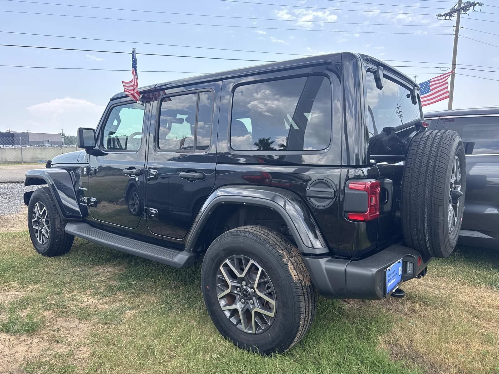 Used 2024 Black Jeep Sahara image 6