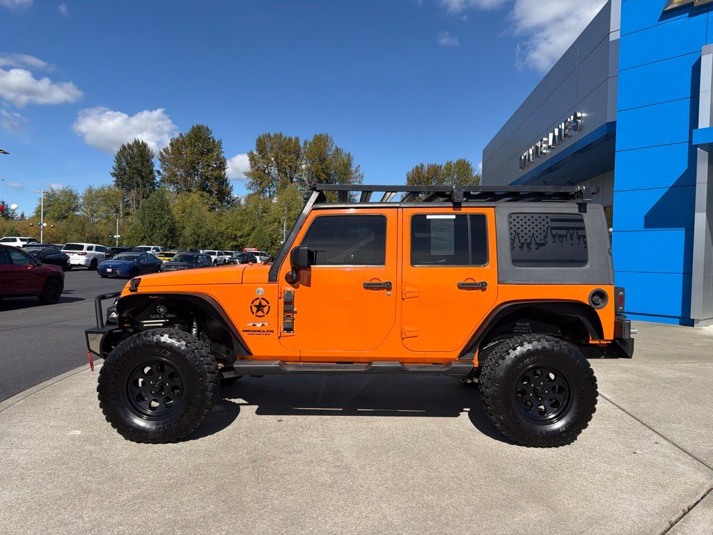 Used 2012 Jeep Wrangler Unlimited Sahara with VIN 1C4BJWEG7CL272014 for sale in Arlington, WA