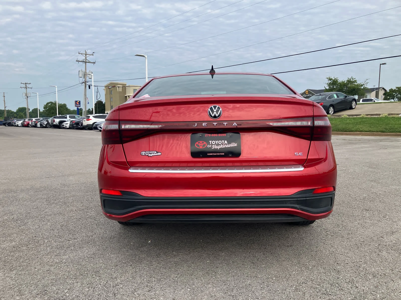 Used 2025 Kings Red Metallic Volkswagen SE image 6