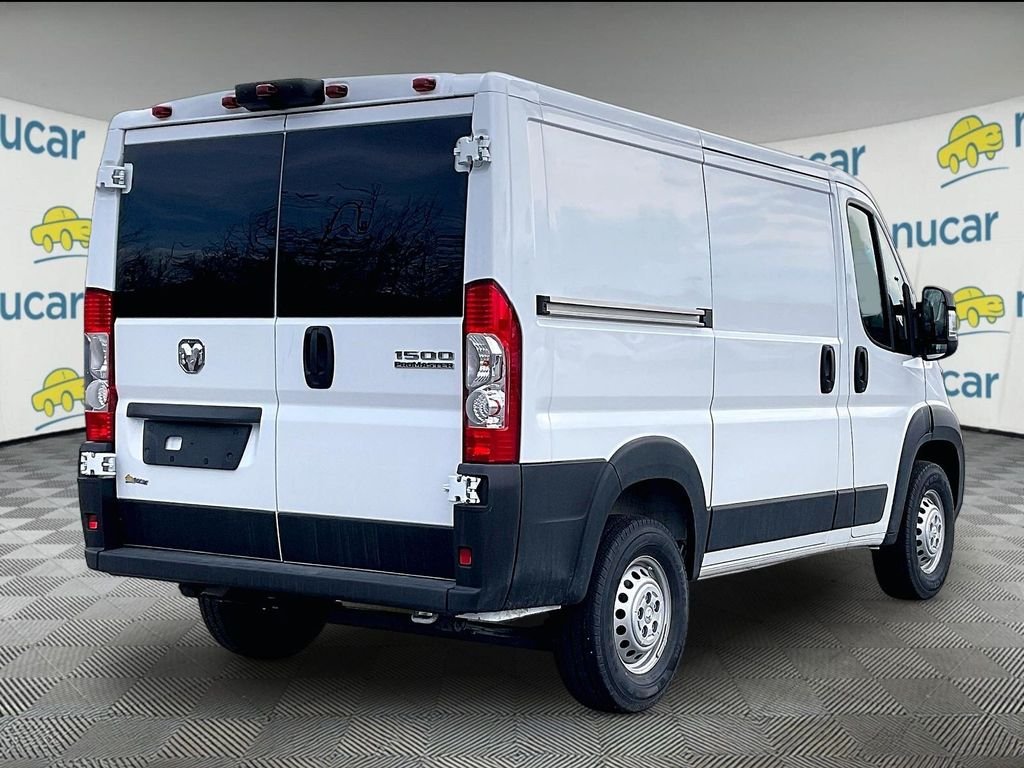 New 2026 Bright White Clearcoat Ram Low Roof image 7