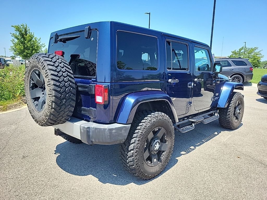 Used 2013 Blue Jeep Unlimited Sahara image 5