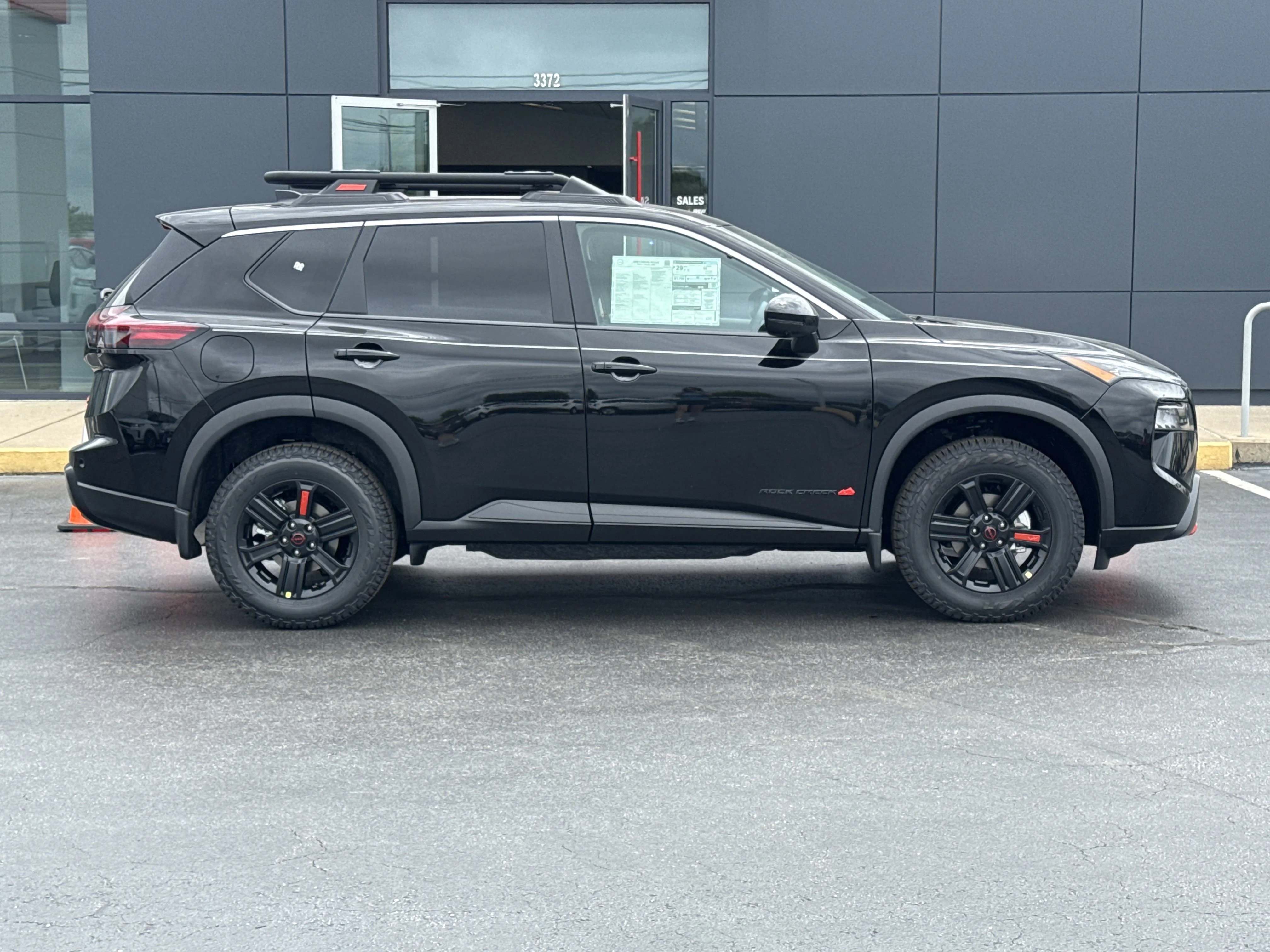 New 2026 Super Black Nissan Rock Creek AWD image 2