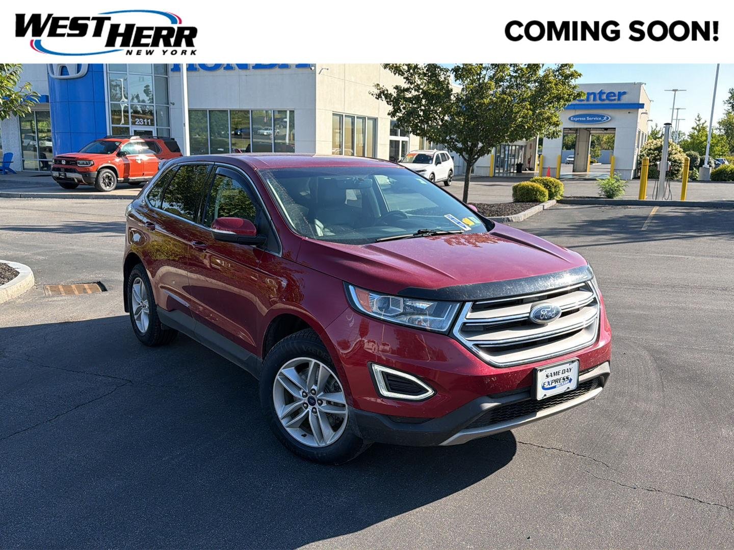Used 2018 Ruby Red Metallic Tinted Clearcoat Ford SEL image 1