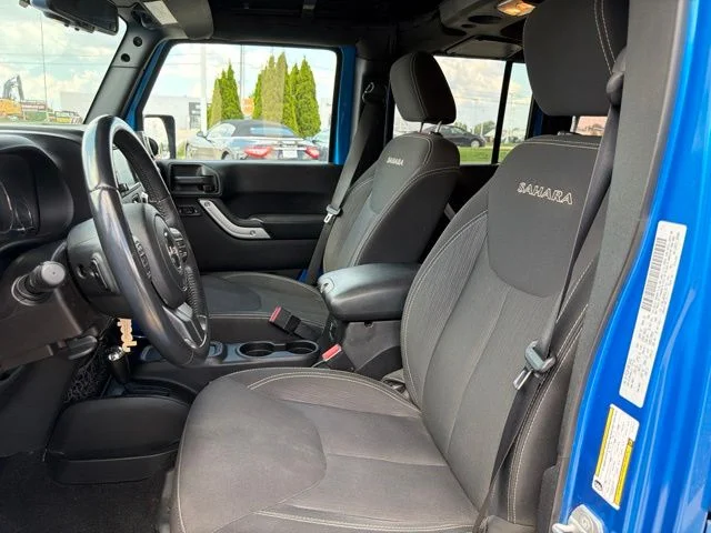 Used 2016 Blue Jeep Unlimited Sahara image 13