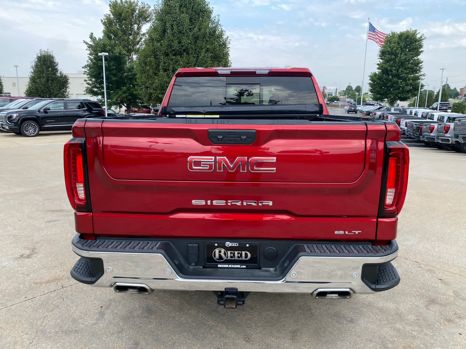 Used 2024 Volcanic Red Tintcoat GMC SLT image 4