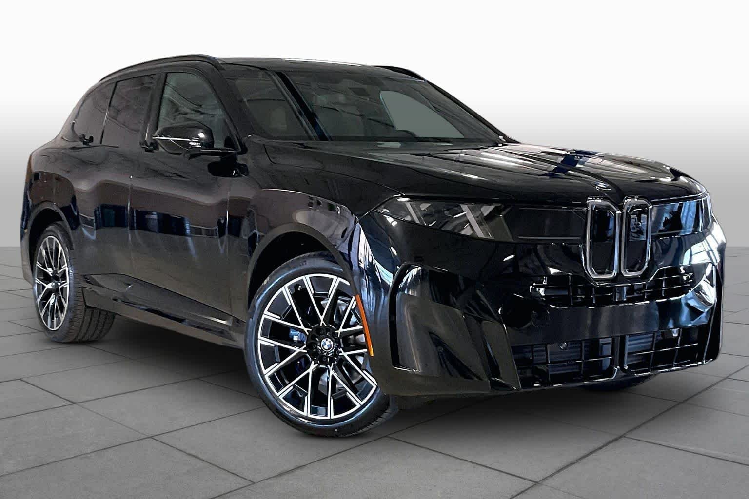 New 2027 Black Sapphire Metallic BMW 40 xDrive image 2