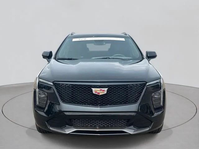 Used 2025 Stellar Black Metallic Cadillac Sport image 2