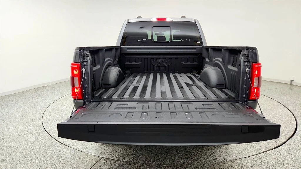 Used 2023 Carbonized Gray Metallic Ford XLT 4WD SuperCrew 6.5