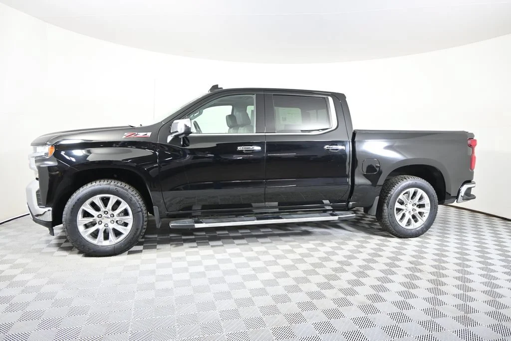 Used 2020 Chevrolet Silverado 1500 LTZ with VIN 1GCUYGEL0LZ299818 for sale in Forest Lake, Minnesota