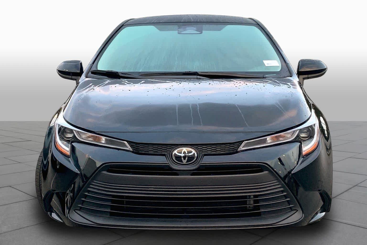 Used 2024 Midnight Black Metallic Toyota LE image 4