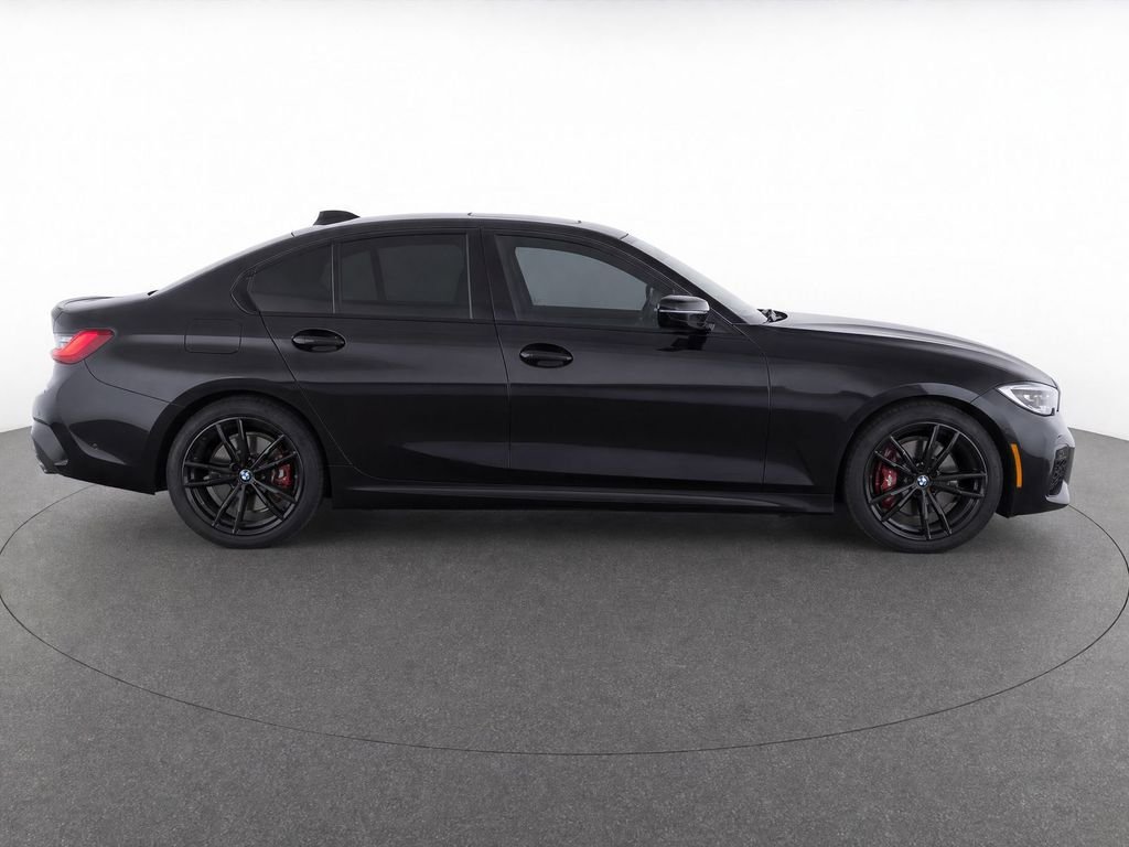 Used 2022 Black Sapphire Metallic BMW M340i image 2
