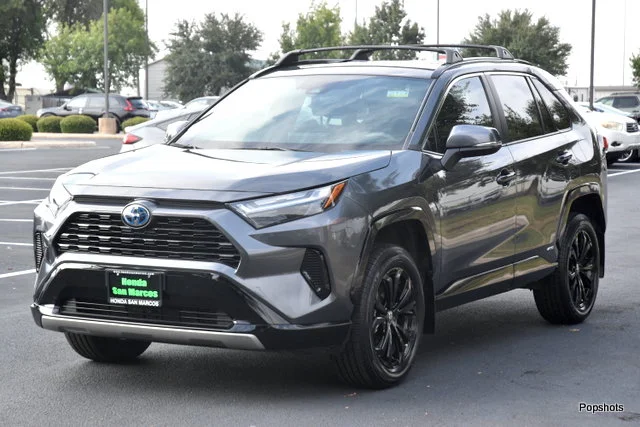 Used 2023 Magnetic Gray Metallic Toyota SE image 1