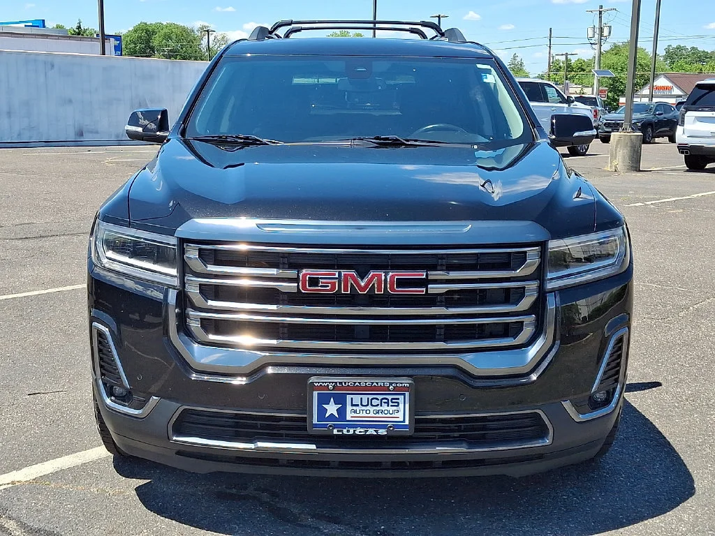 Used 2021 EBONY TWILIGHT METALLIC GMC AT4 image 4