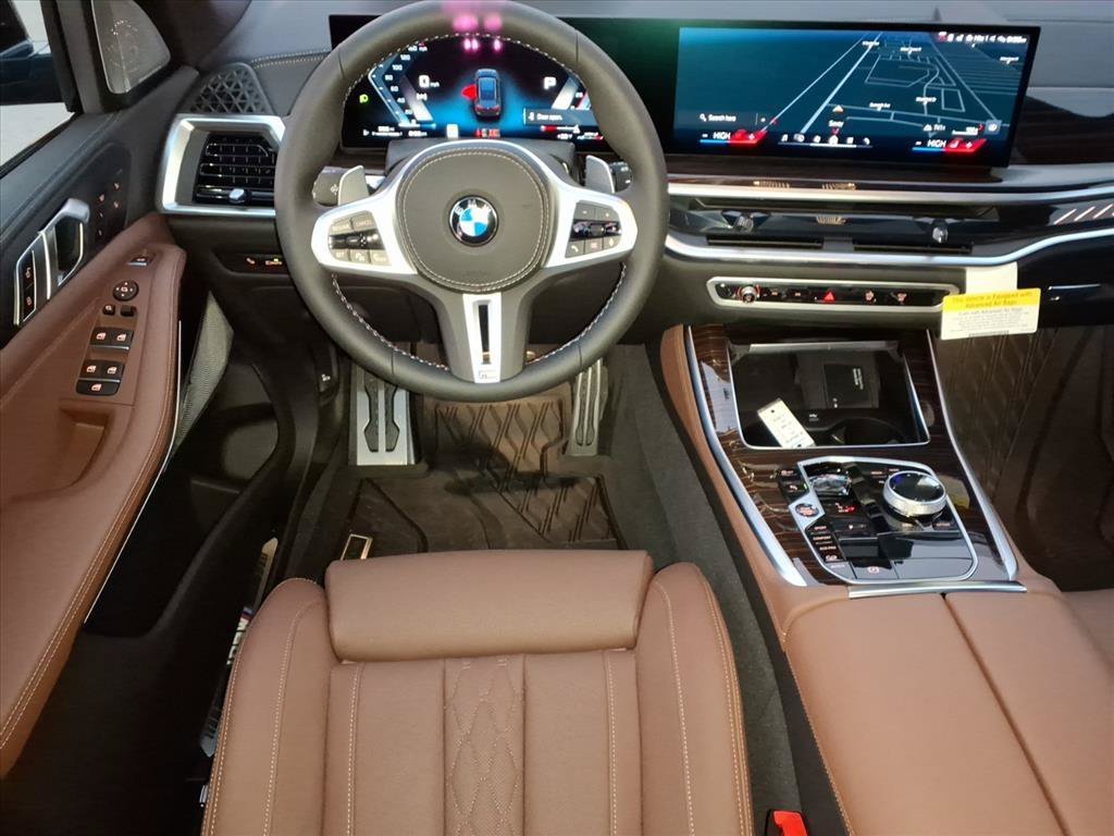 Used 2026 Black Sapphire Metallic BMW M60i image 3