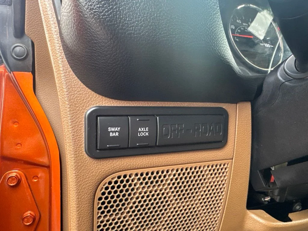 Used 2011 Orange Jeep Rubicon image 25
