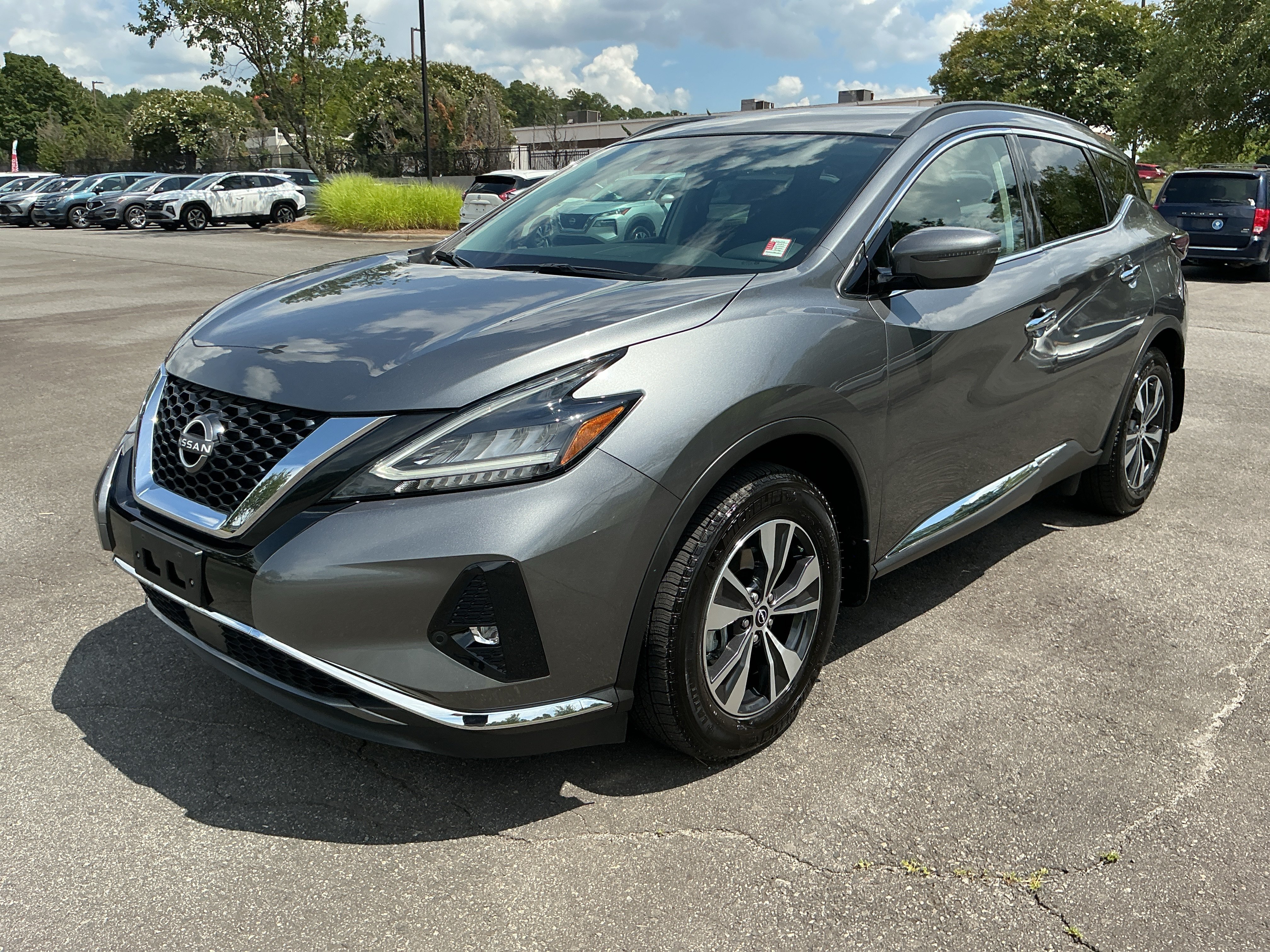 Used 2024 Gun Metallic Nissan SV image 1