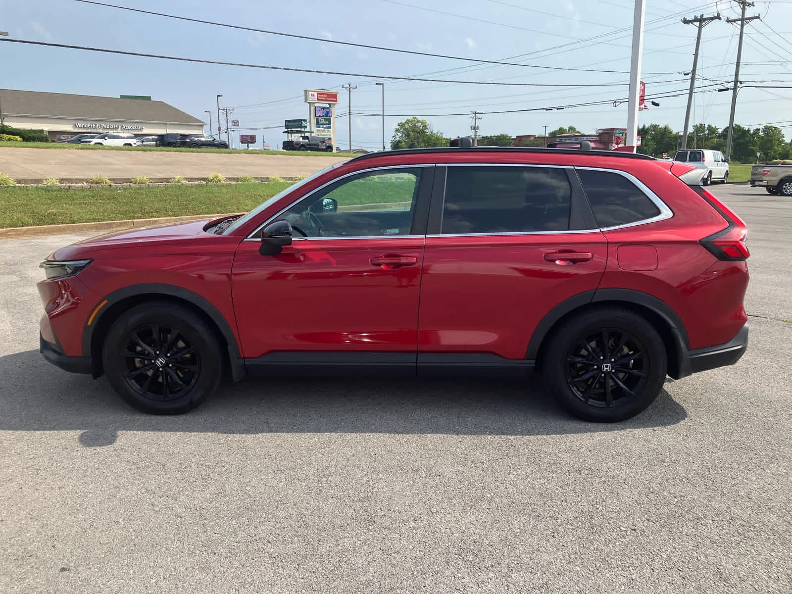 Used 2023 Radiant Red Metallic Honda Sport image 4