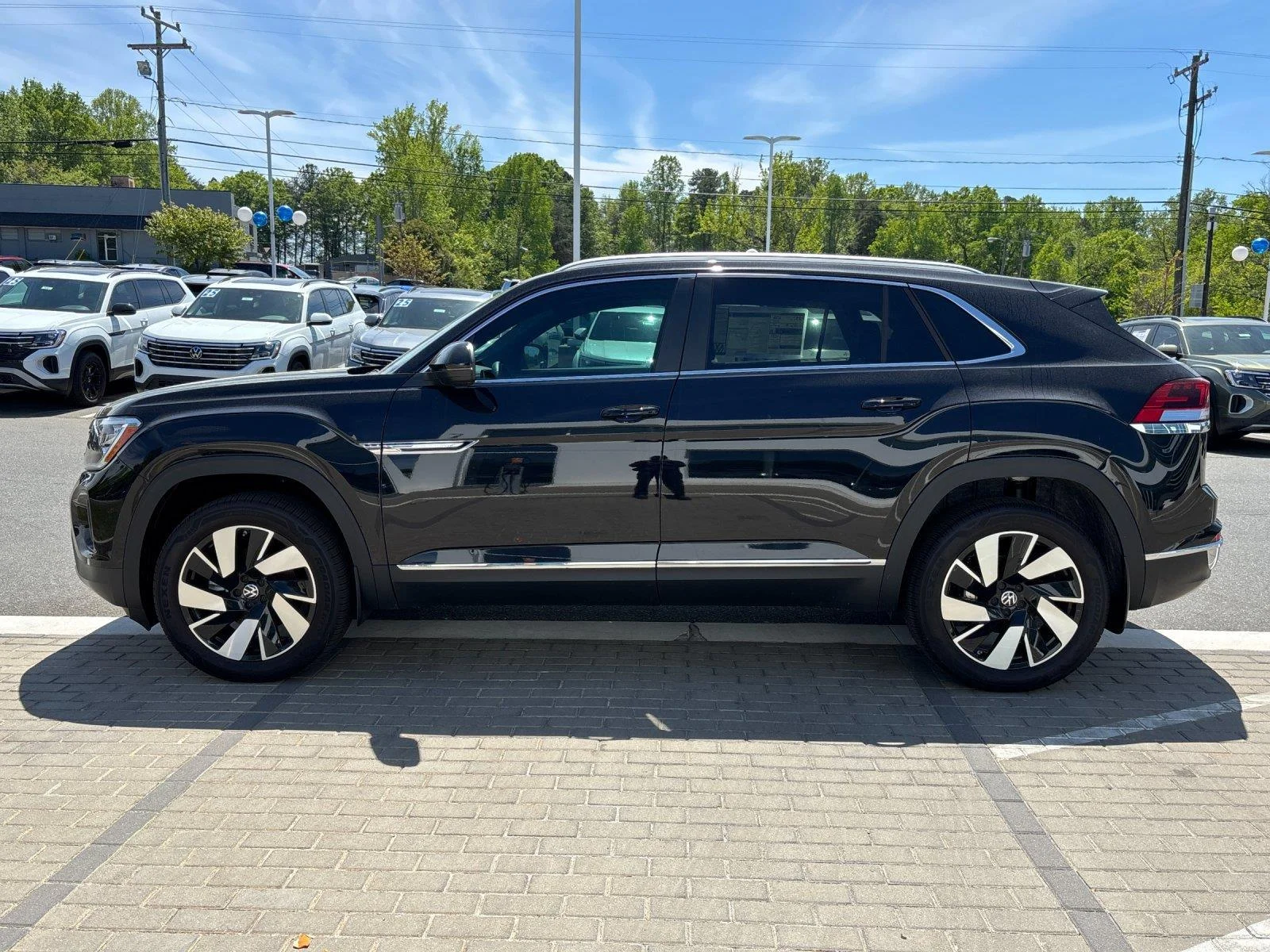 New 2025 Deep Black Pearl Volkswagen 2.0T SEL image 2