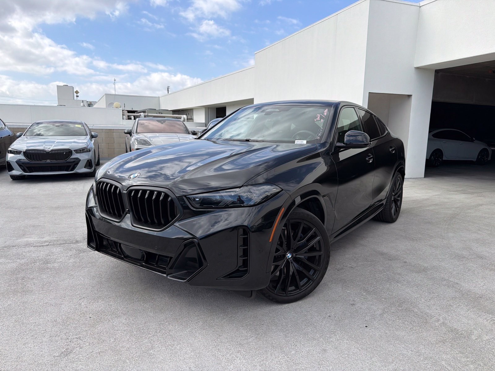 Certified Used 2024 Black Sapphire Metallic BMW xDrive40i image 3
