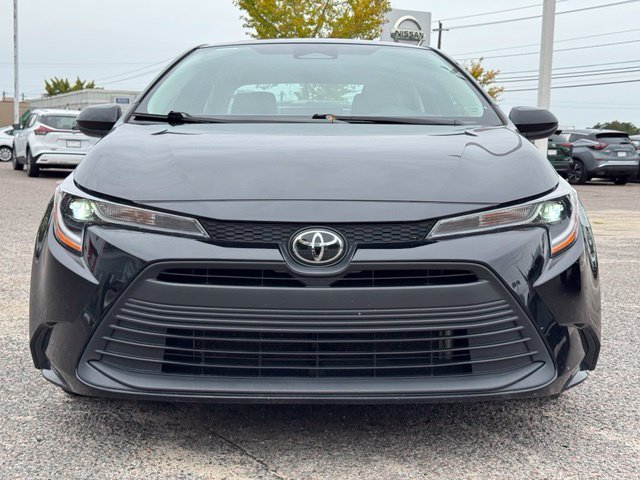 Used 2025 Midnight Black Metallic Toyota LE image 2
