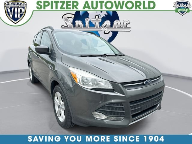 Used 2016 Gray Ford SE image 1
