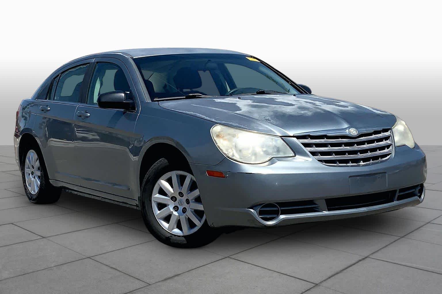 Used 2010 Silver Steel Metallic Chrysler Touring image 2