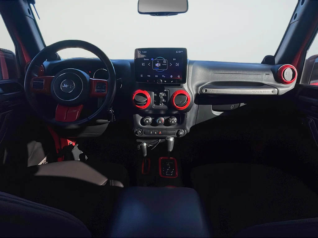 Used 2013 Red Jeep Unlimited Sport image 10